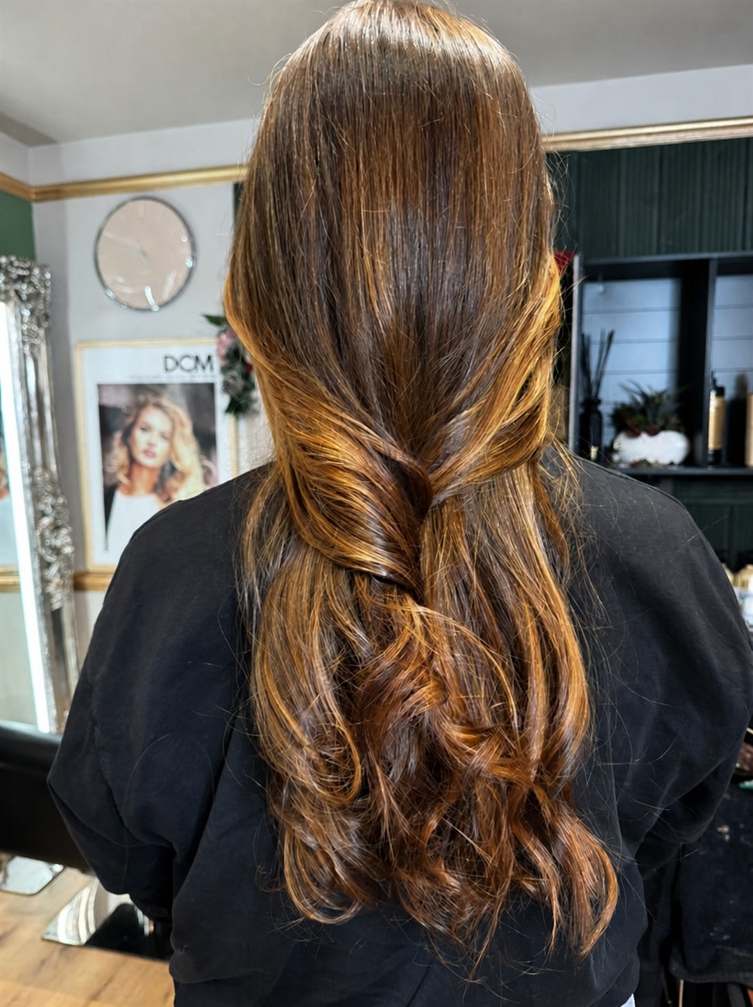 Glossy brunette styling created at Miramor Salon